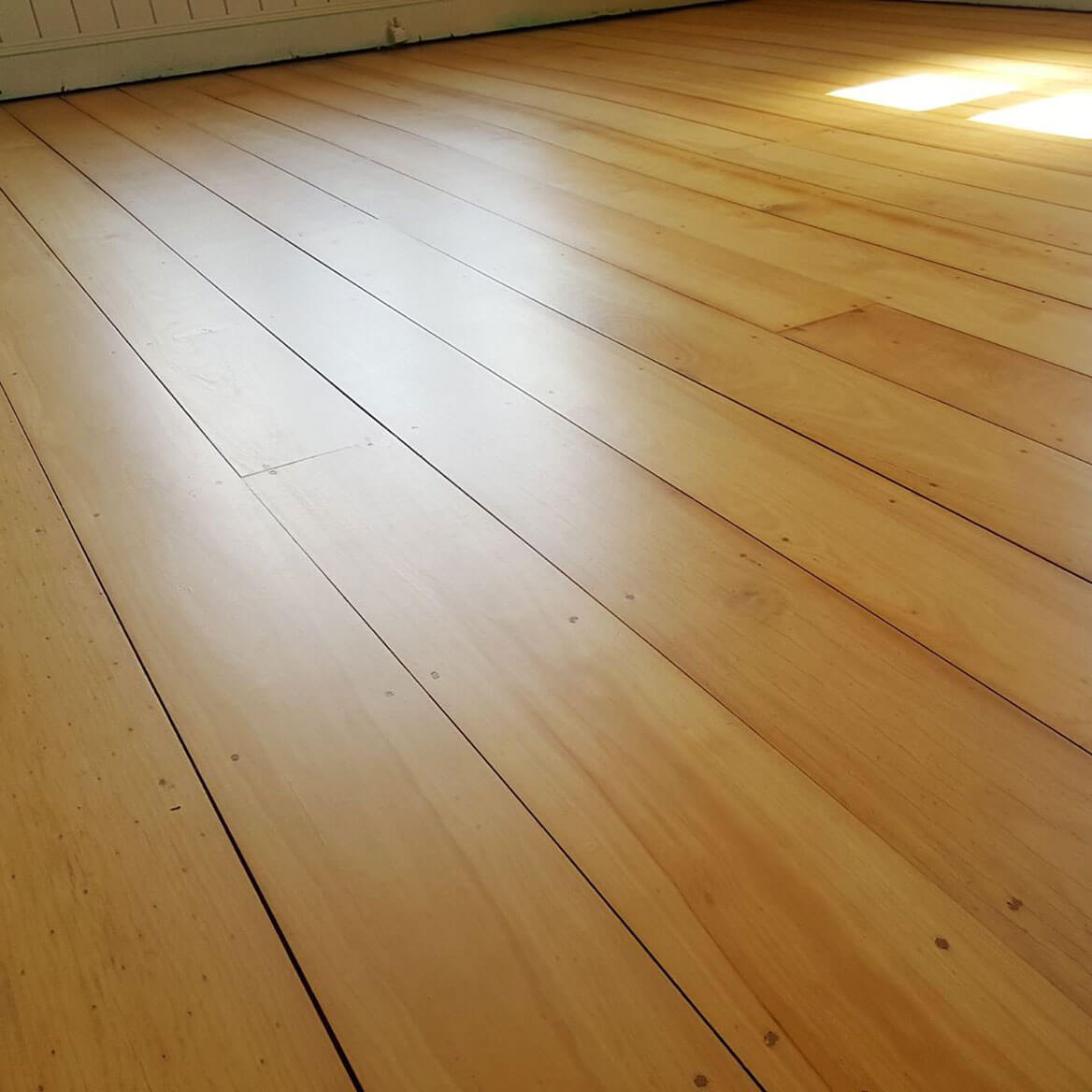 Hoop Pine sanded and polished flooring
